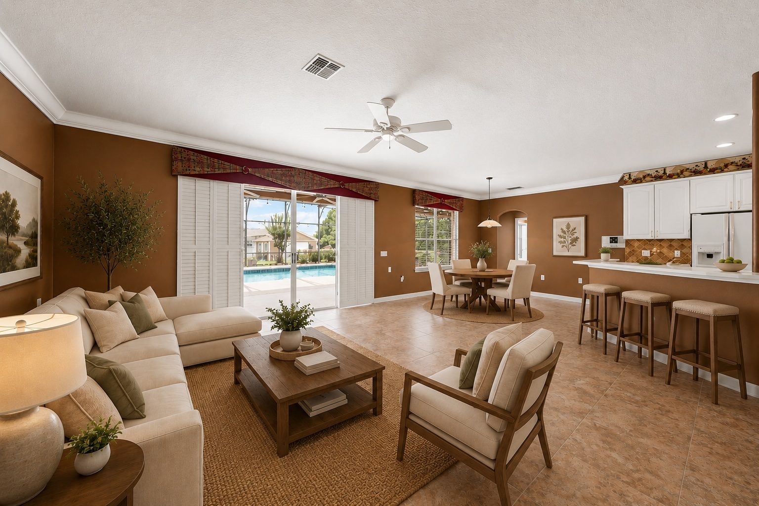 Family room open to the kitchen and pool