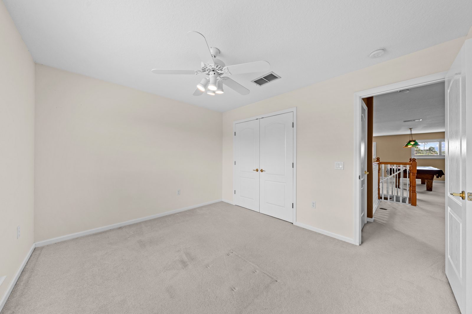 Bedroom opening to the upstairs loft