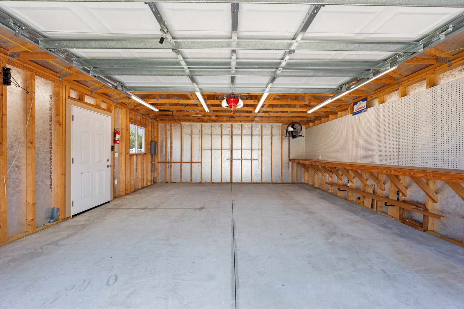 Inside the detached workshop with workbench